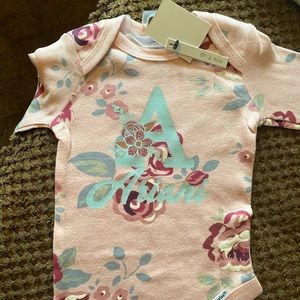 Handmade onesies and baby clothes